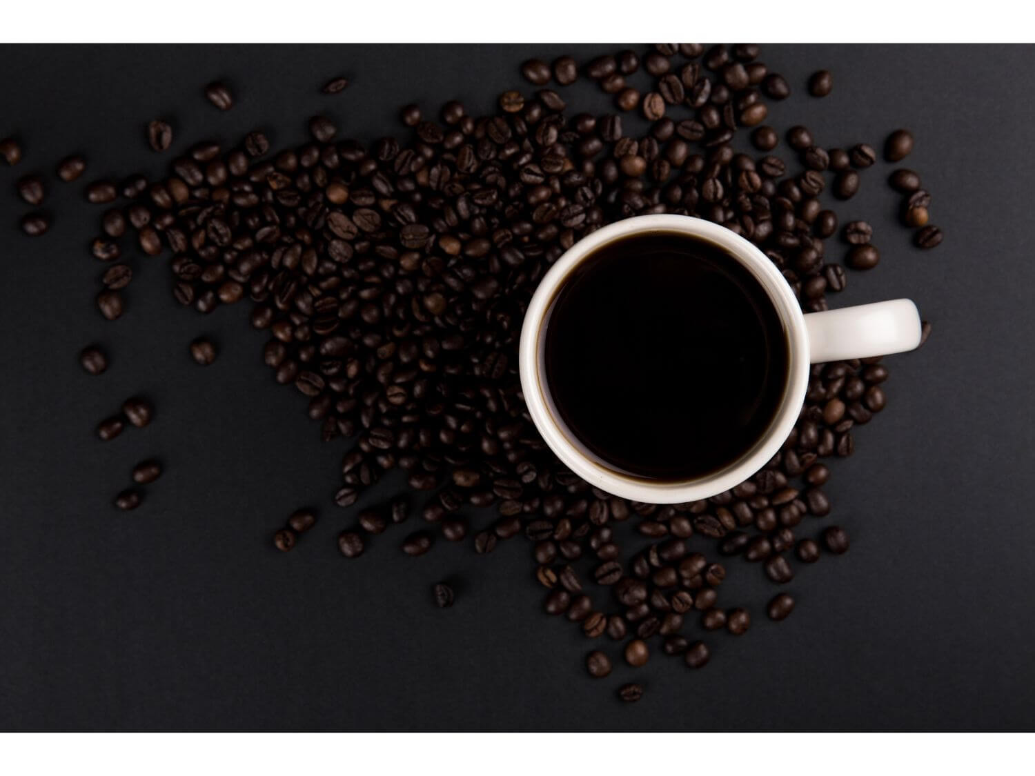A cup of coffee and beans