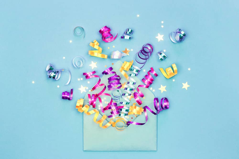 Green envelope with colourful exploding confetti showing female orgasm