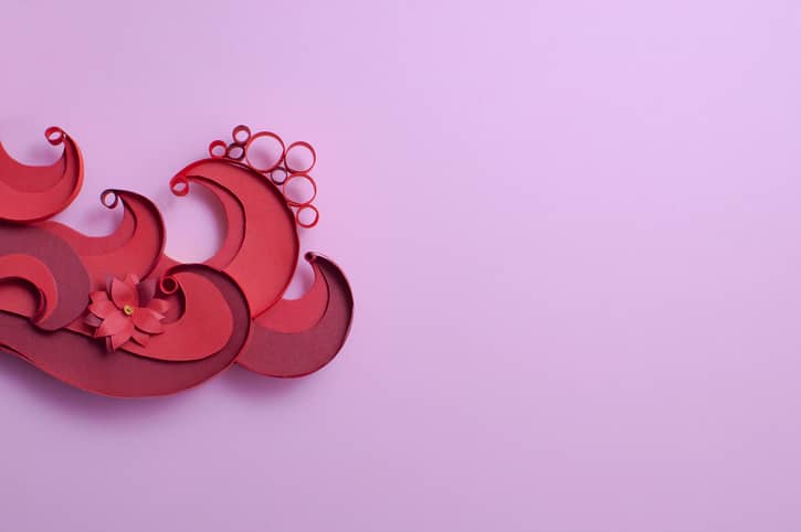 Papercraft image of red swirls to represent first time sex blood