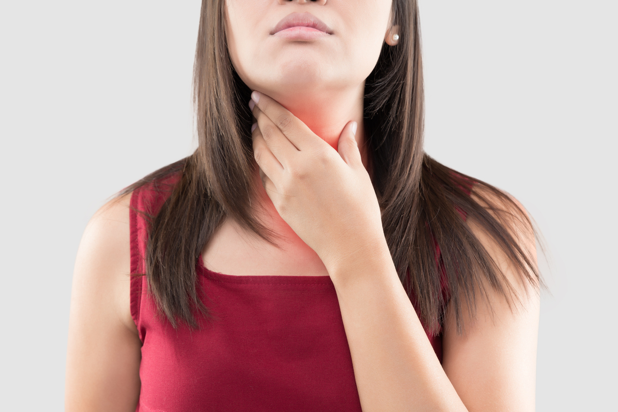 woman-touching-neck-lump
