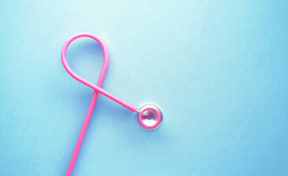 Pink stethoscope in the shape of breast cancer ribbon