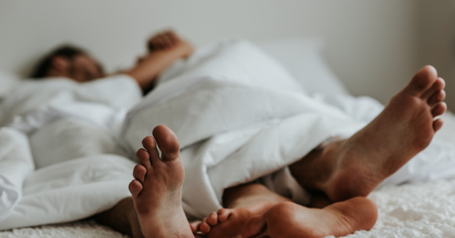 Couple with high sex drive in bed