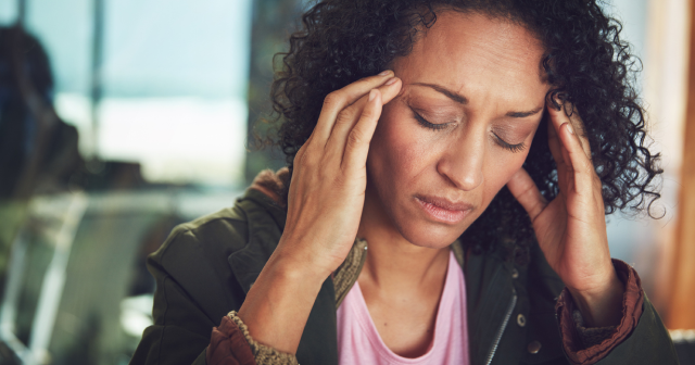 Woman suffering from hormonal headache during the perimenopause